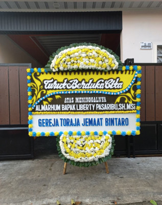 Papan Bunga Duka di Tiakar